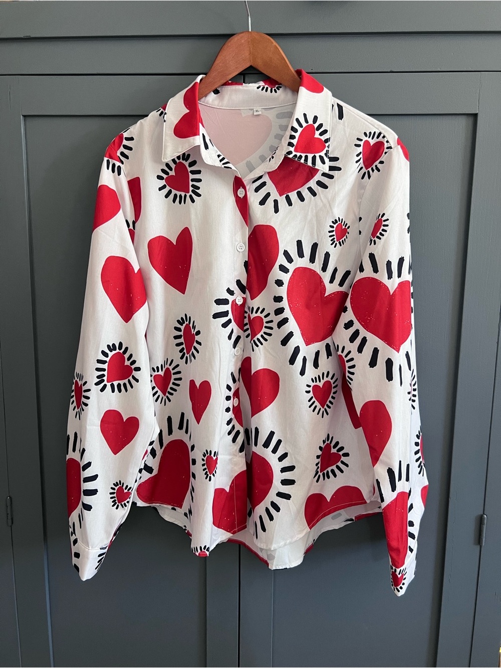 Keith Harding-inspired white blouse with red hearts.